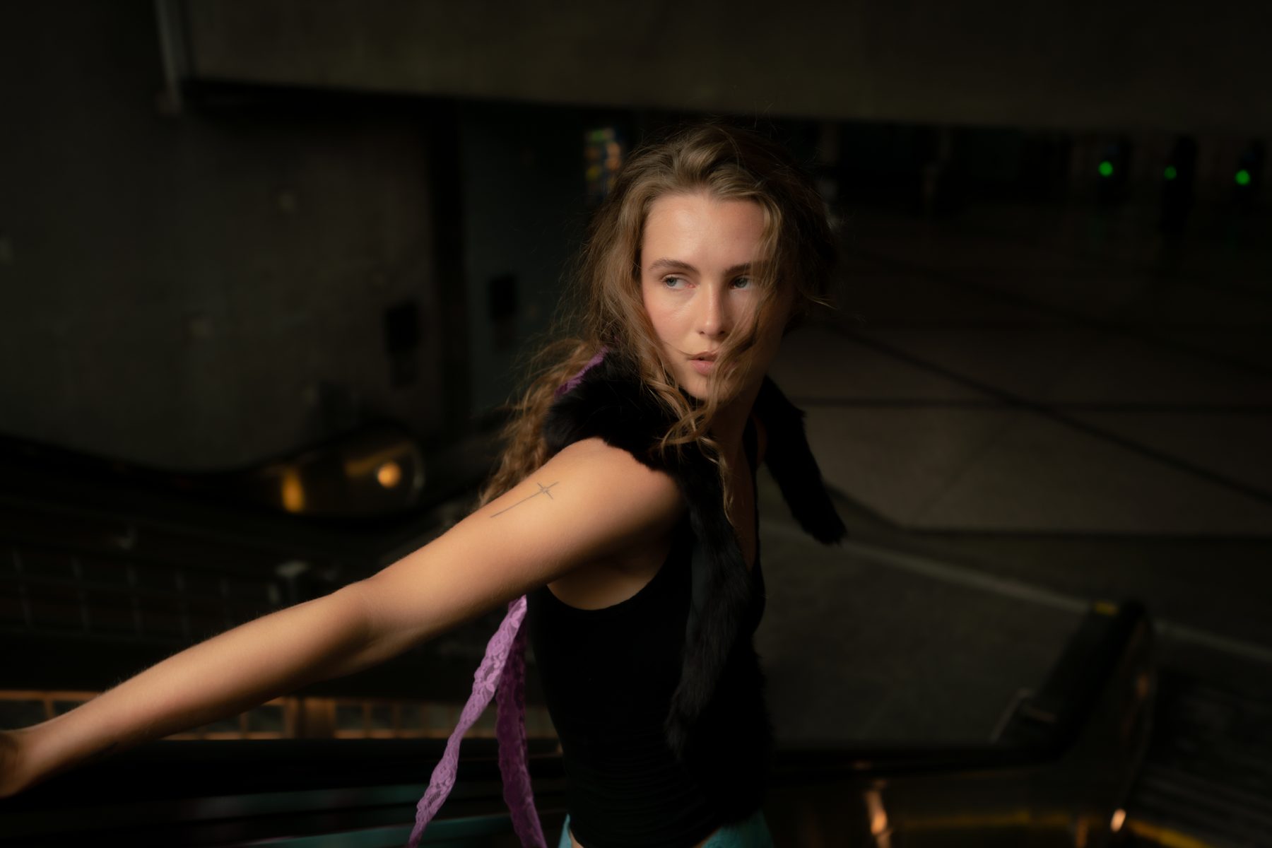 Carly, cover portrait, reaching arm, purple lace detail